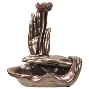 Hands Holding A Lotus Flower Backflow Incense Burner